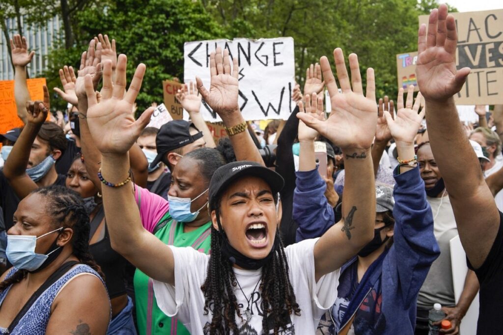 Protesters demonstrate in New York on Thursday as outrage continues to grow over the death of George Floyd.