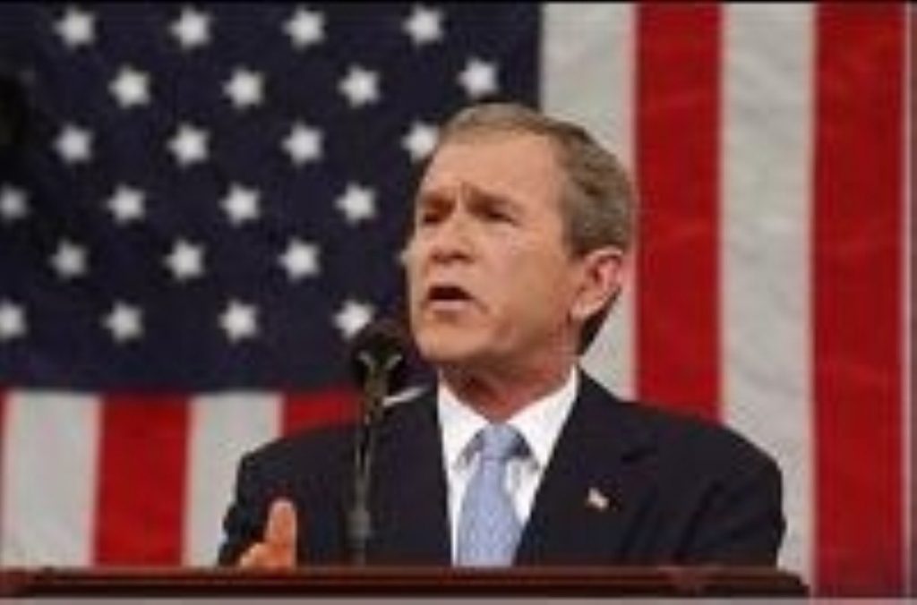 Bush, Putin united on nuke-free "axis of evil"