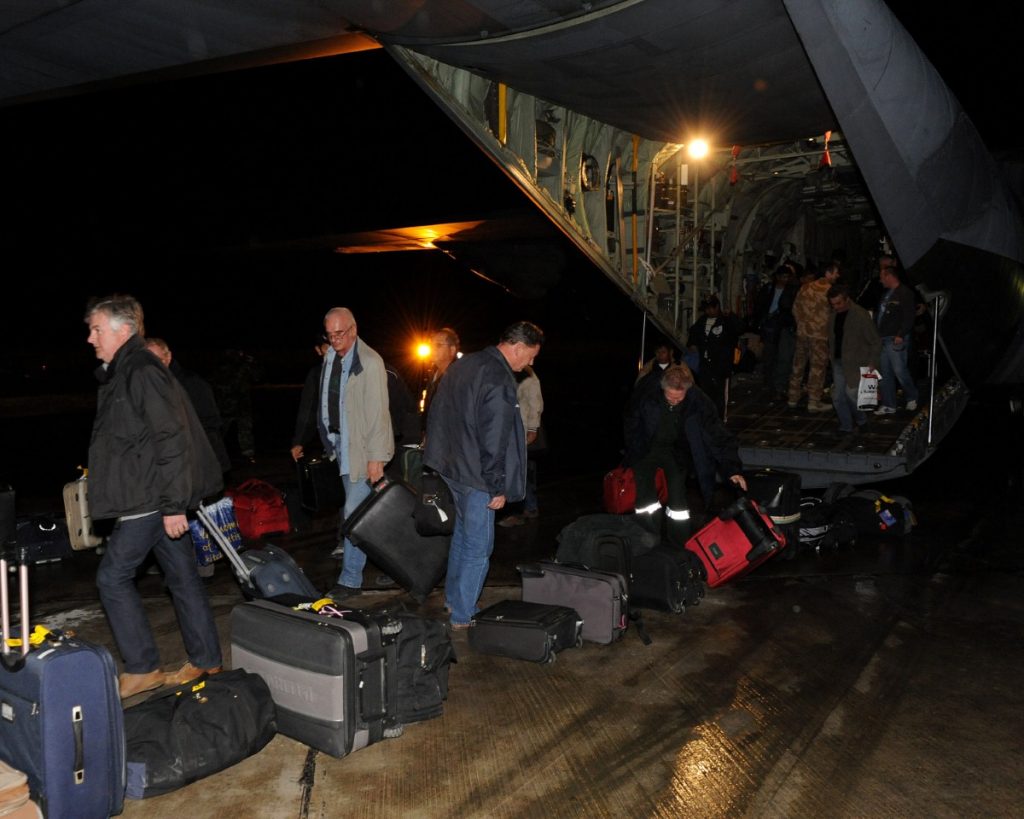 British oil workers rescued by two RAF Hercules transport aircraft arrive in Malta