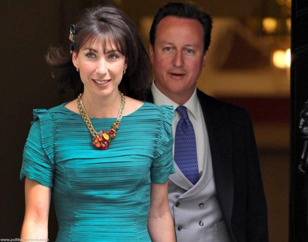 David Cameron and Samantha Cameron emerge from No 10 to attend the royal wedding