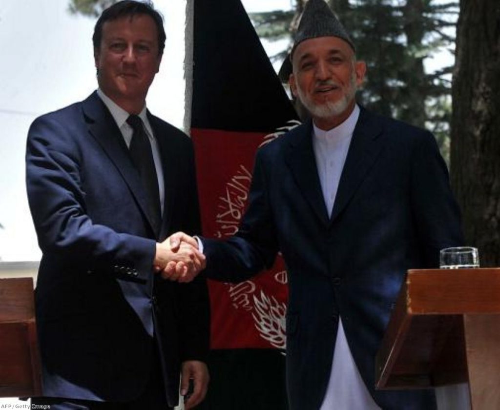 David Cameron and Afghan president Hamid Karzai in Kabul yesterday.