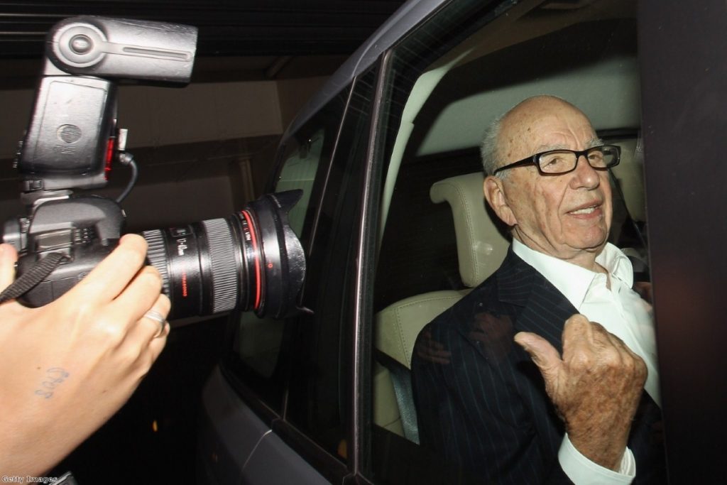 Rupert Murdoch steps back from UK newspaper business