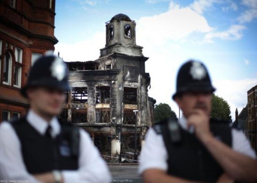 Police survey the damage in Croydon, south London