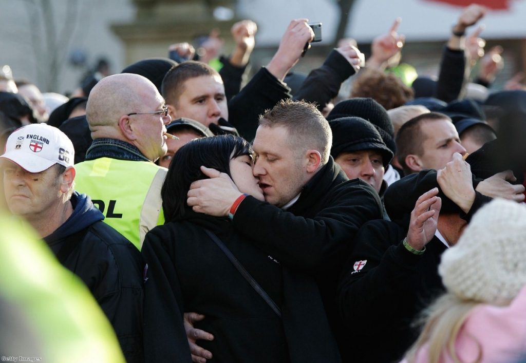 A couple get amorous during an EDL march in 2010