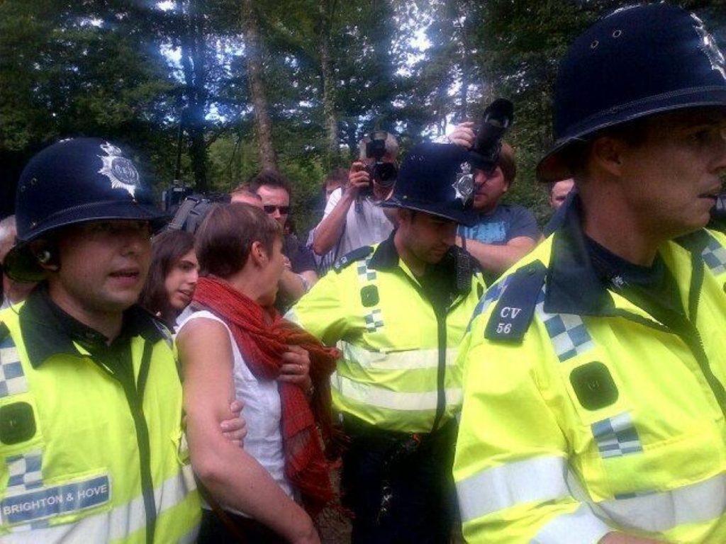 Caroline Lucas is led away by police. Photo credit: No Dash For Gas