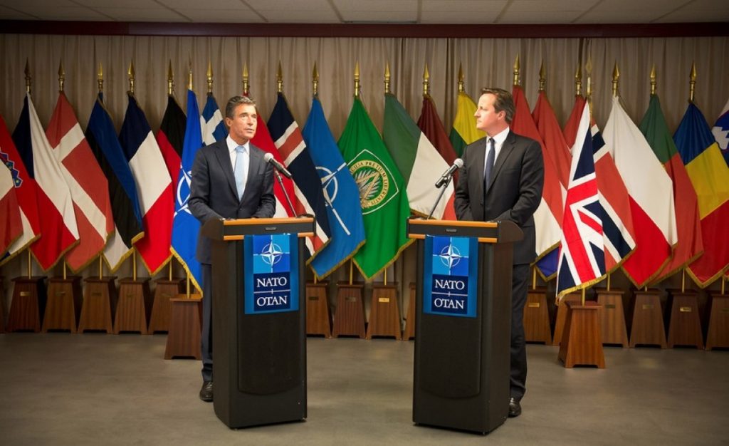 Nato secretary-general Anders Fogh Rasmussen and David Cameron 'still have work to do' before next month's summit