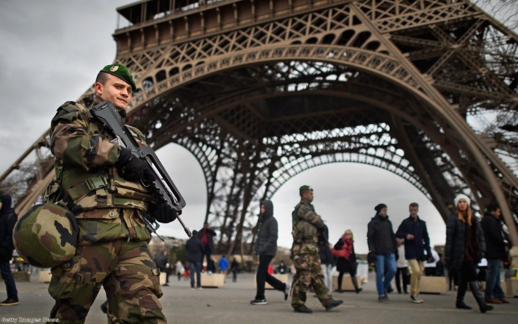 French troops patrol around the Eifel Tower on January 12, 2015