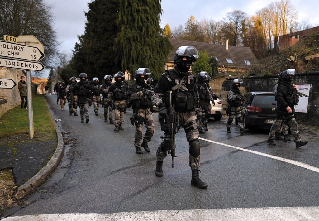French police special forces carry out searches as part of an investigation into the Charlie Hebdo attack