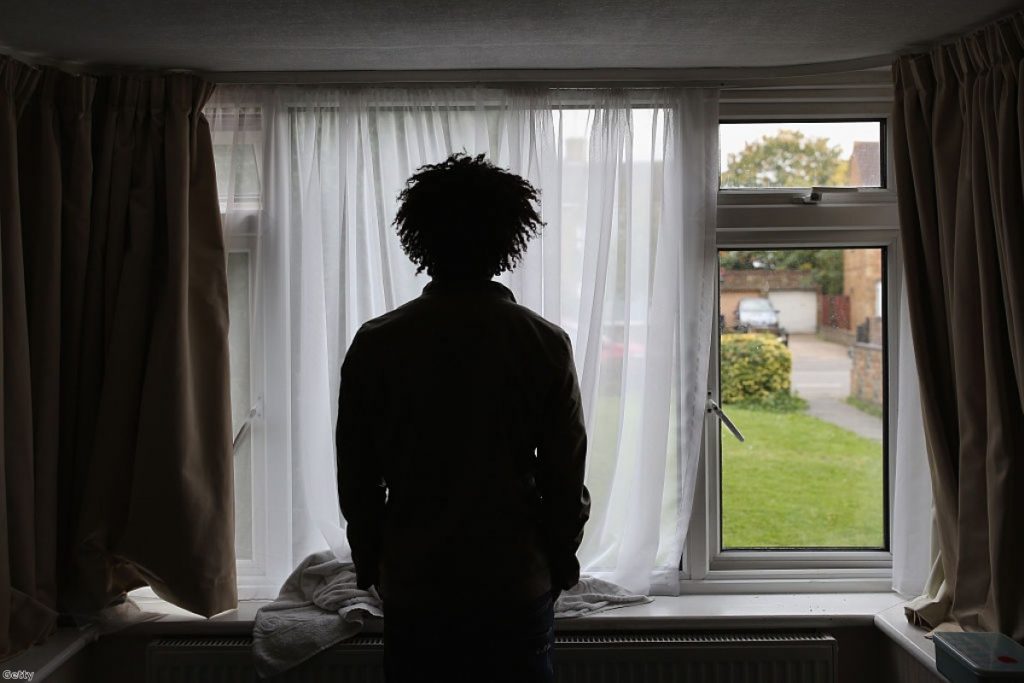 Merhawi, 25, from Eritrea stands inside his single room accommodation in Longford last year