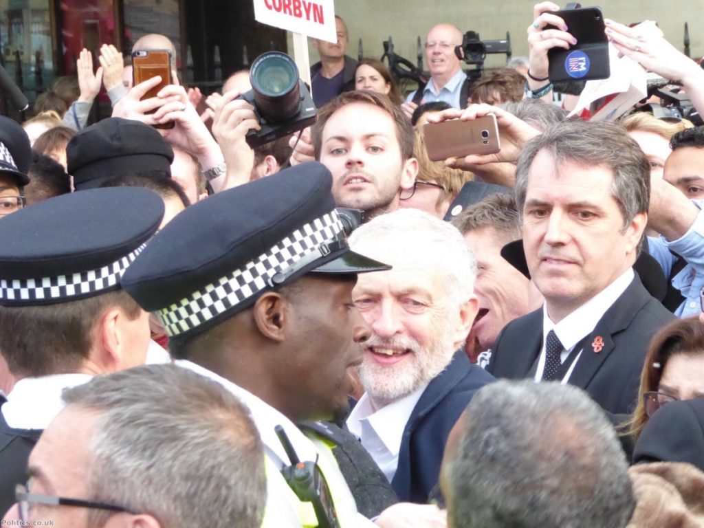 Jeremy Corbyn surrounded by supporters