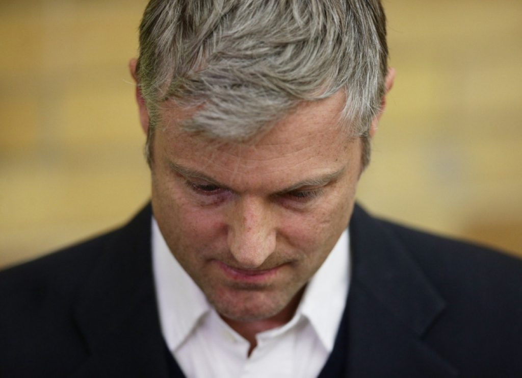 Zac Goldsmith looks dejected during a speech by victorious Lib Dem candidate Sarah Olney last night