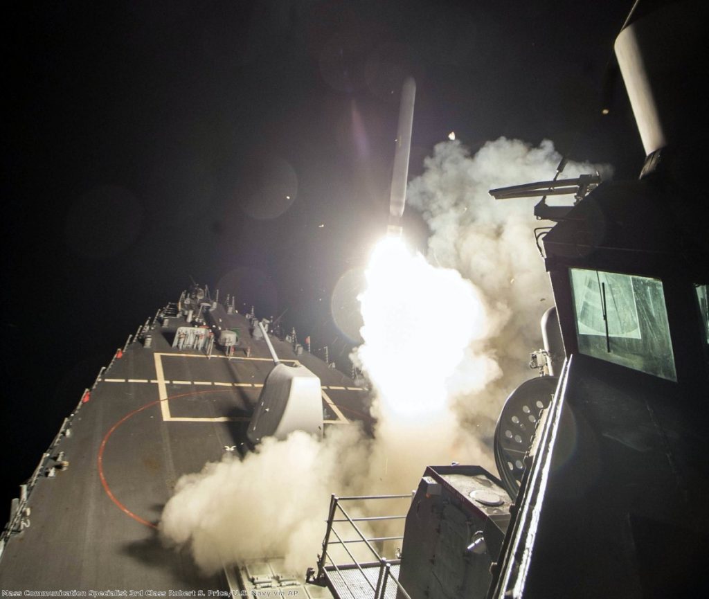 The USS Ross (DDG 71) fires a tomahawk land attack missile Friday, April 7, 2017, from the Mediterranean Sea 