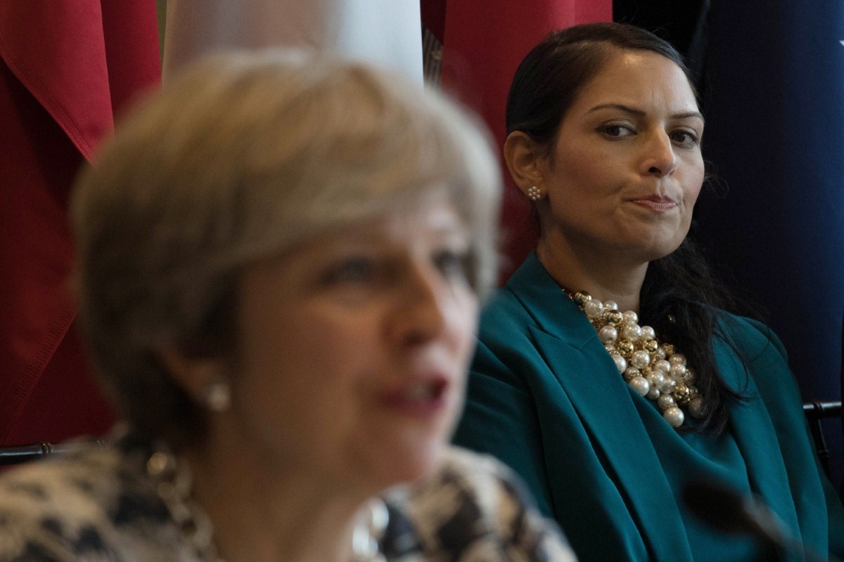 Priti Patel stares at Theresa May during a meeting with UN secretary general Antonio Guterres on how to tackle modern day slavery
