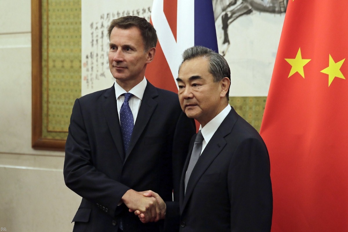 Jeremy Hunt shakes hands with Wang Yi before their meeting in Beijing | Copyright: iStock