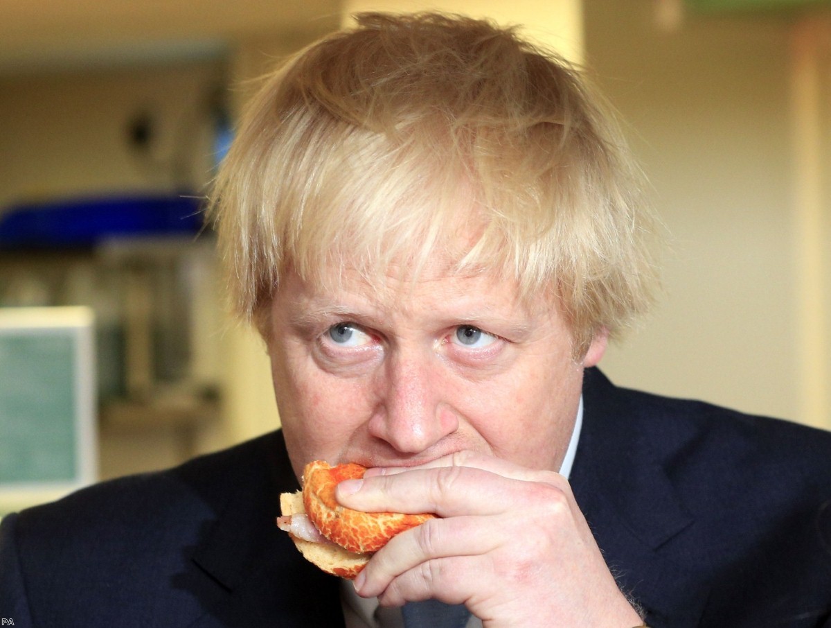 Johnson eats a bacon sandwich during a visit to West Norwood in 2015. The former foreign secretary has a reputation for speaking inaccurately.