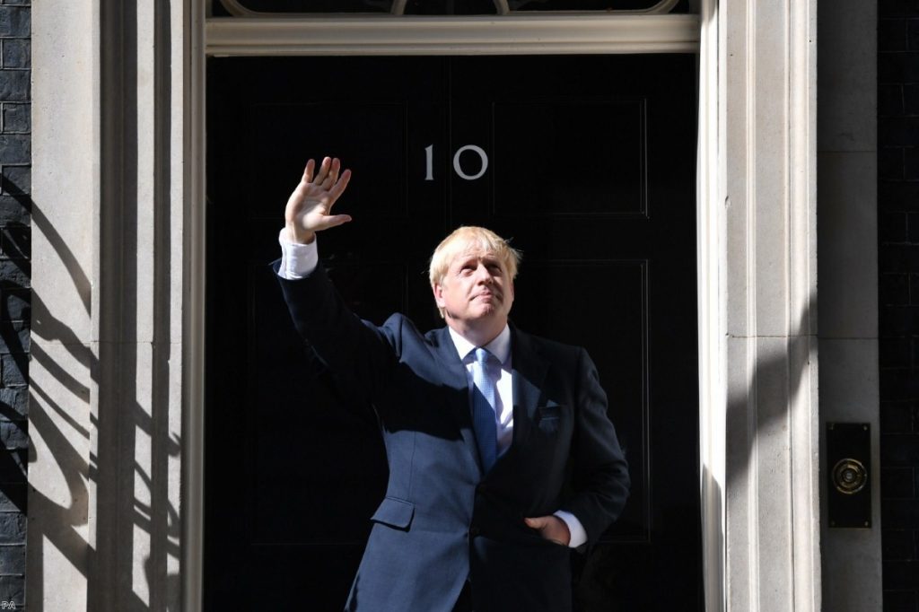 Johnson outside No.10 after he returns from seeing the Queen