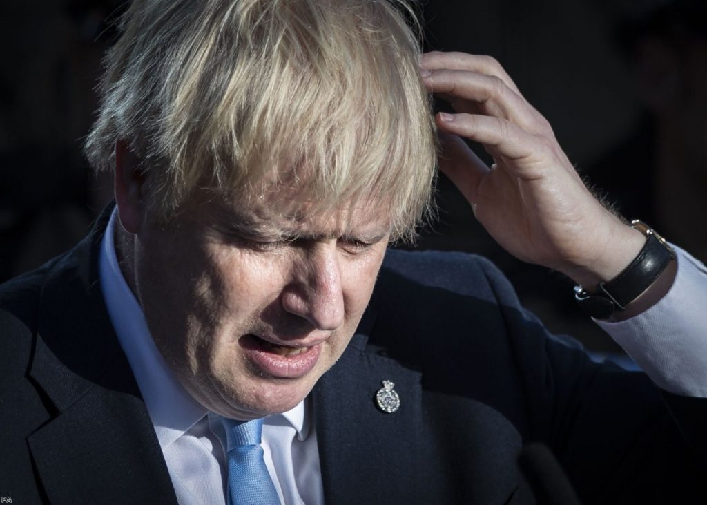 Johnson cut a strained-looking figure at the speech this afternoon.