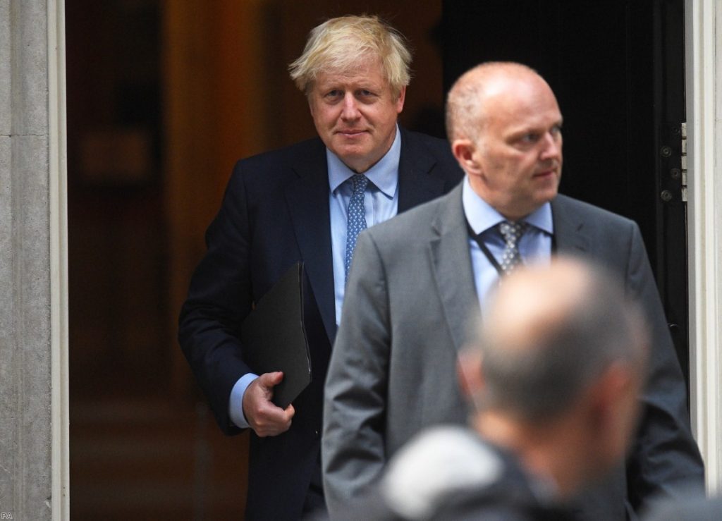 Johnson leaves Downing Street ahead of his statement to the Commons this evening.