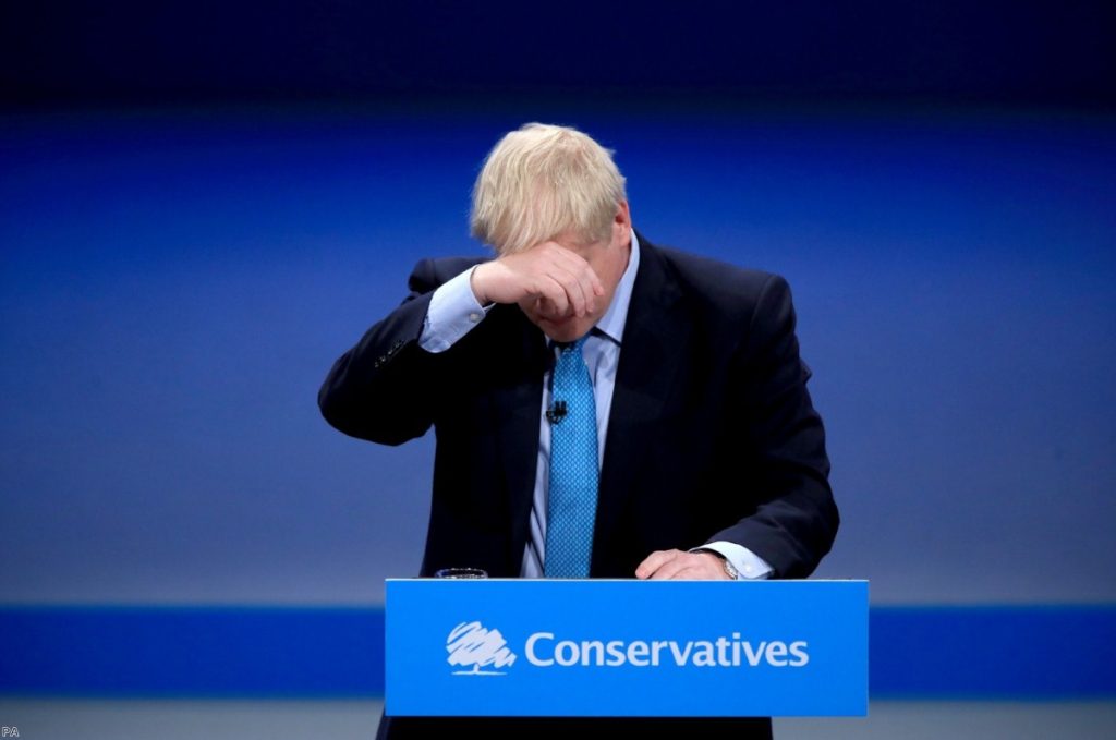 Boris Johnson cuts a subdued figure during his Tory conference speech today.