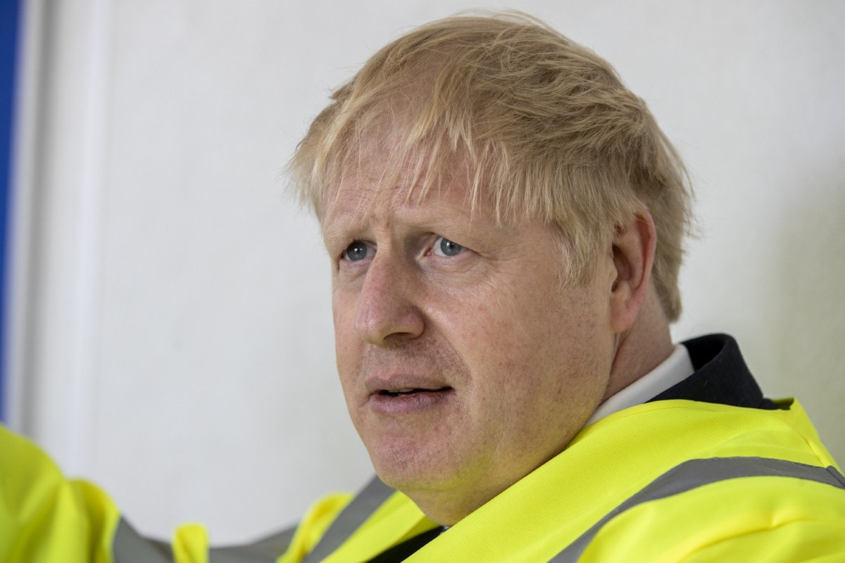 Boris Johnson sported a new haircut as he visited a new rail factory earlier this week, but his exuberance is yet to return (photo: Press Association)