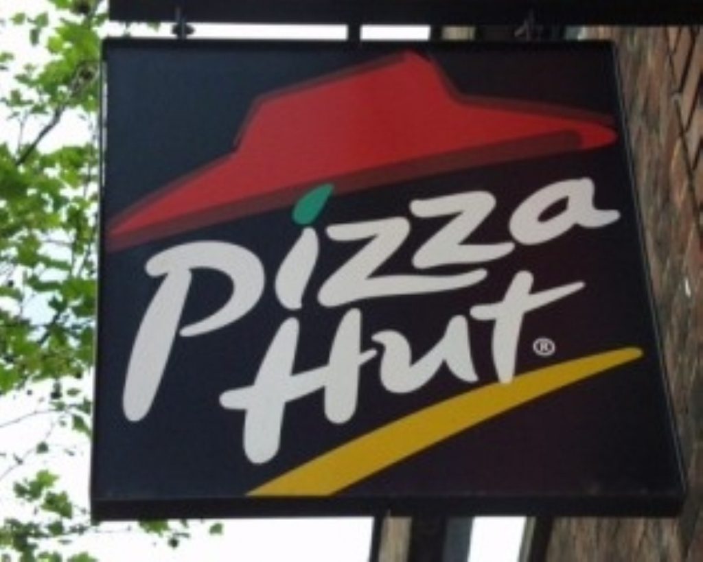 Pizza hut bans smoking in restaurants