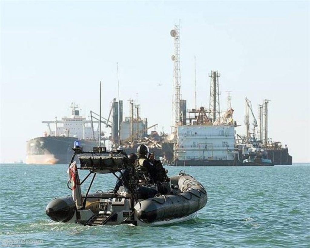 A Royal Navy jet pack and HMS Corwnall operating in the northern Gulf