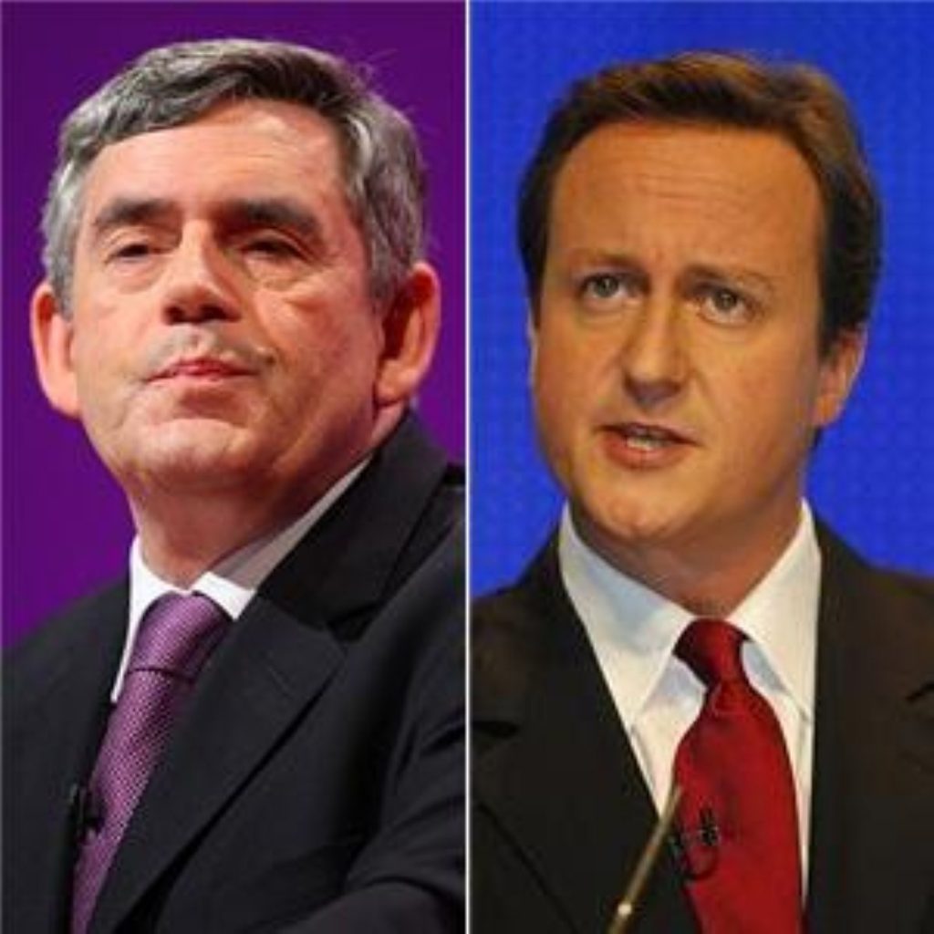 Gordon Brown and David Cameron lock horns over economic policies