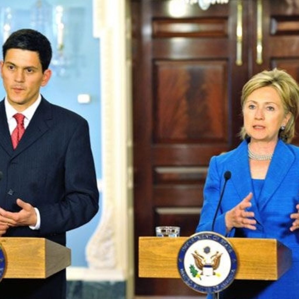 Hillary Clinton with David Miliband yesterday