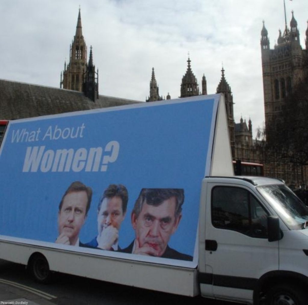 A woman's group drives an advertising billboard around parliament during the 2010 general election.