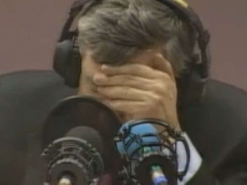 Gordon Brown reacts with horror as he hears his gaffe for the first time