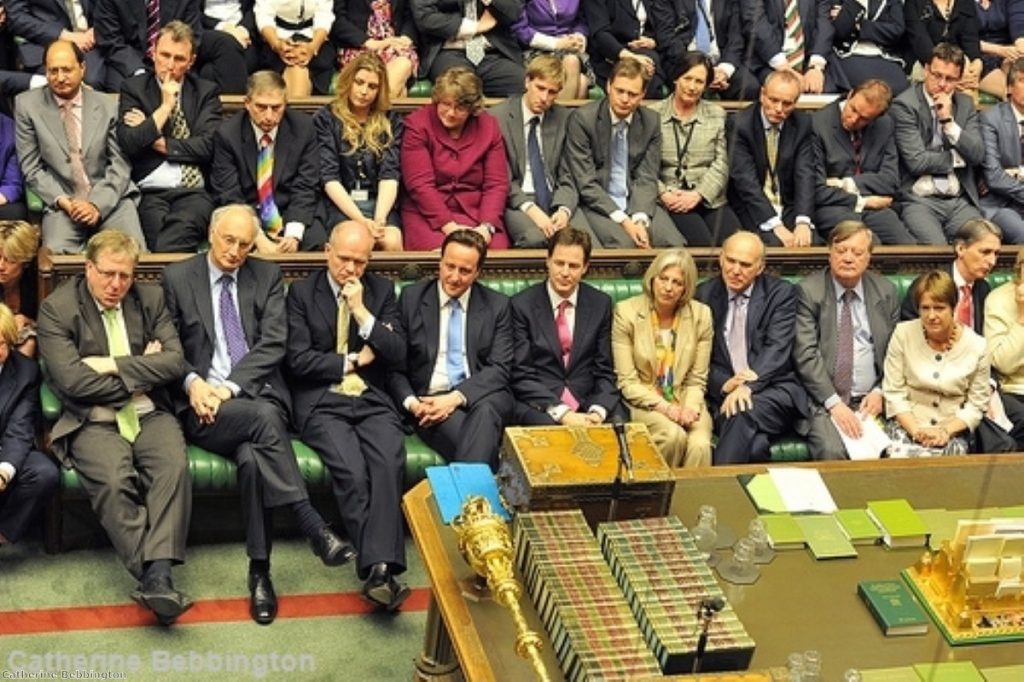 David Cameron enjoys the view from the government benches during the Queen's Speech debate