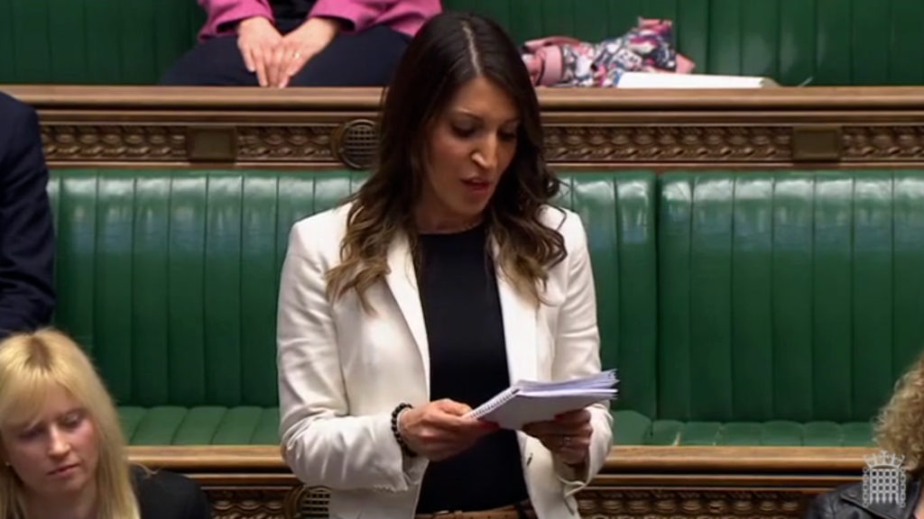 Rosena Allin-Khan looking at notes in the House of Commons