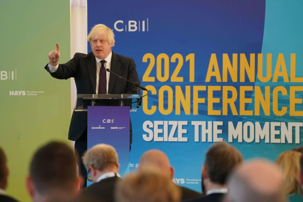 Government will 'get to' lower taxes, PM tells CBI