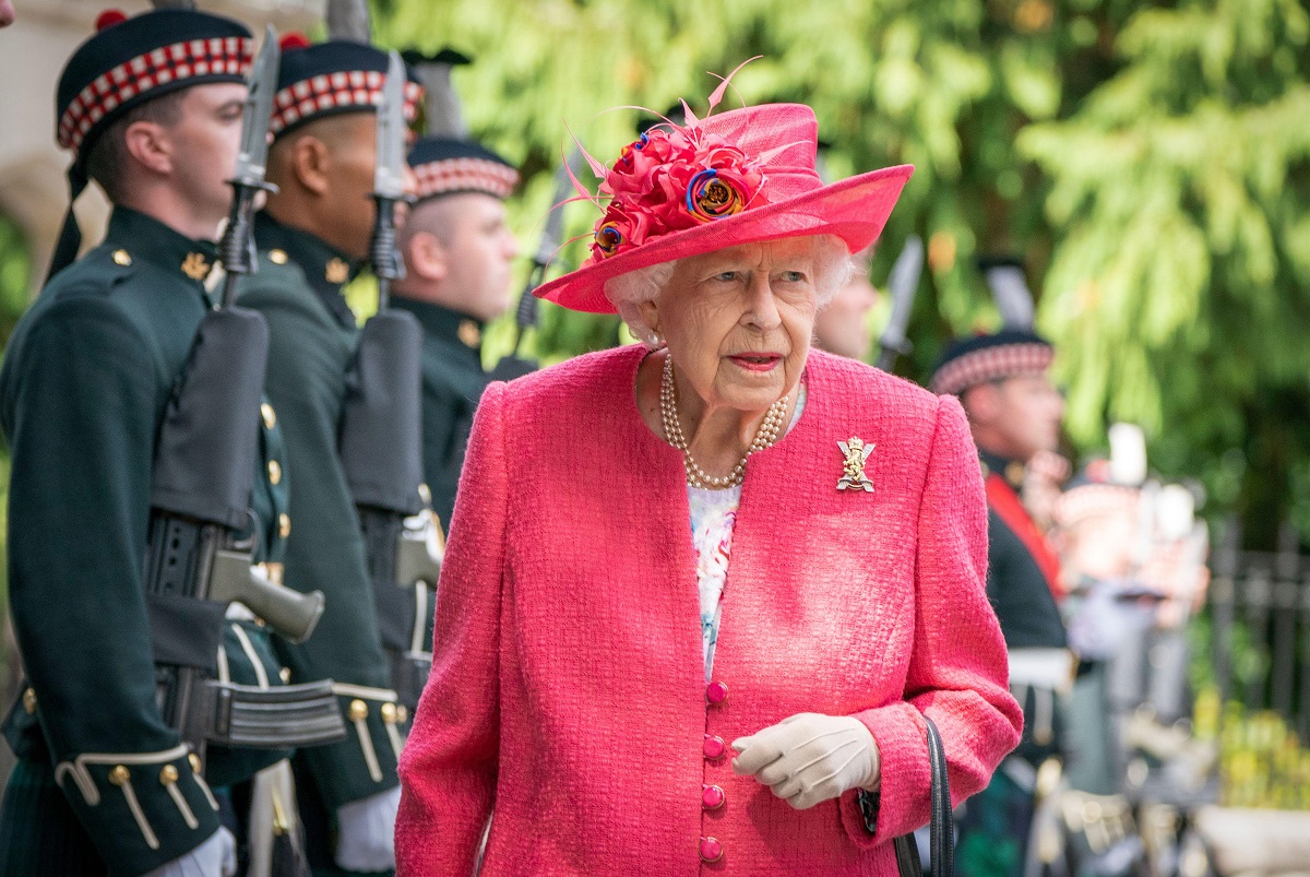 Queen Elizabeth II during an inspection of the Balaklava Company, 5 Battalion The Royal Regiment of Scotland at the gates at Balmoral, as she takes up summer residence at the castle. Picture date: Monday August 9, 2021.