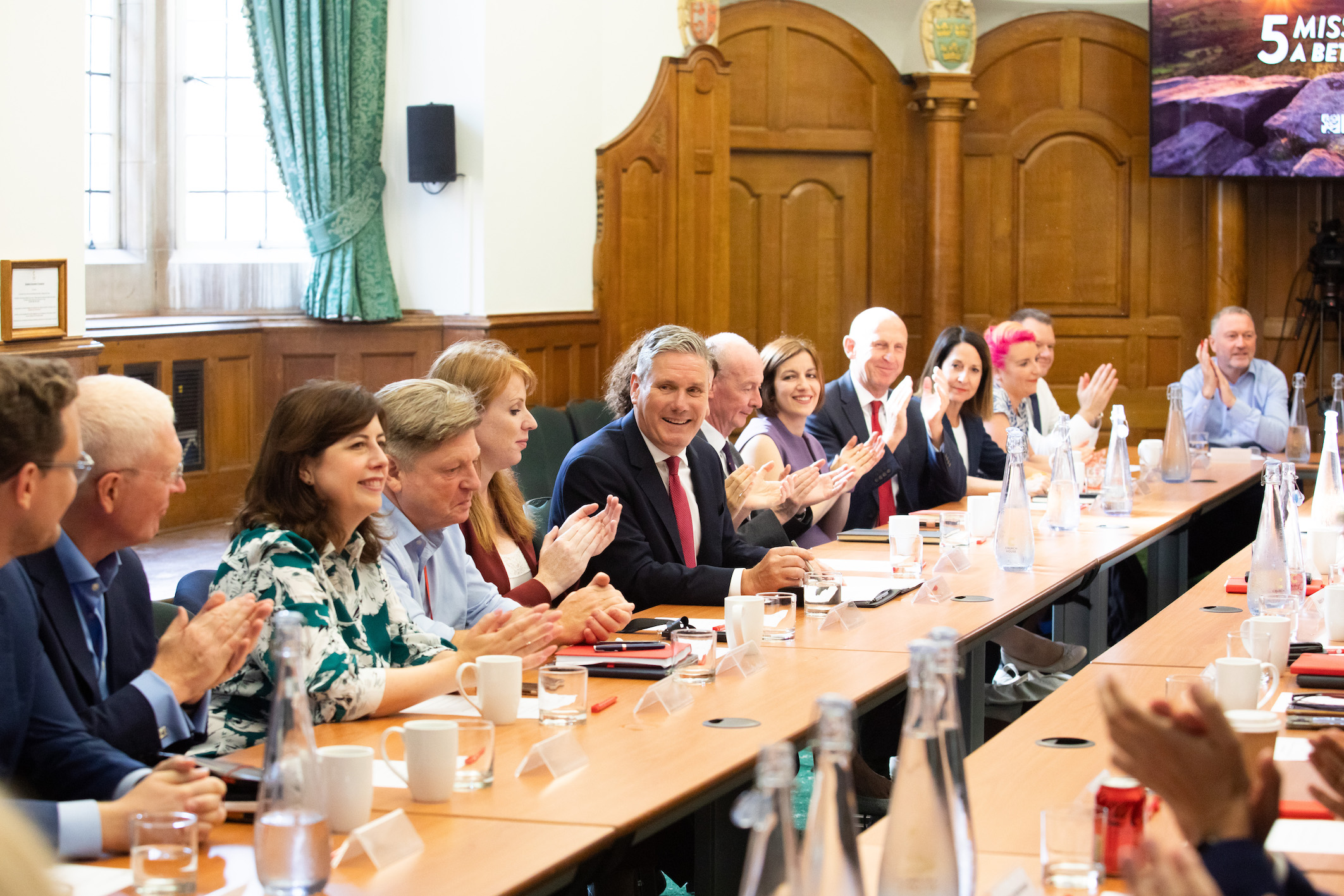 Keir Starmer addresses the shadow cabinet, with the "five missions" writ in the background. Keir Starmer's "five missions" encapsulate his political platform.